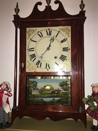 Mitchel and Atkins, Pillar and Scroll shelf clock, wood movement, 30 hour, Mahogany veneer, eagle hands, reverse painted glass door, 30" high, circa 1833