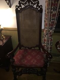 Ornate Carved and Caned Back Arm Chair