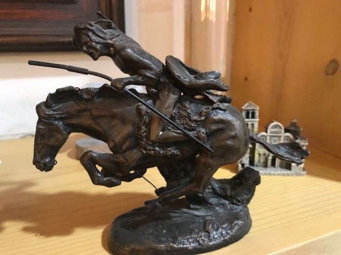 A reproduction sculpture Remington. "The Bronco Buster Large. Bronco Buster" was one of the first of Remington's works that took advantage of the "Lost Wax" process, completed in 1885.