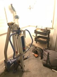 • Entire Room of state-of-the-art Handicap equipment including a $3000.00 M300 Permobil leather motorized wheelchair, new wheelchairs, bathroom wheelchair, home batching and bed devices for handicap, blood pressure machine, home medical devices and equipment