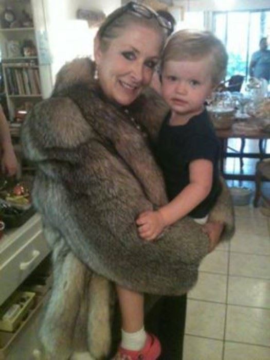 Miss Ruby at sale with child