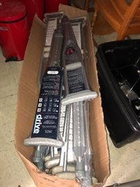 Drive Medical aluminum crutches, all new in packaging.