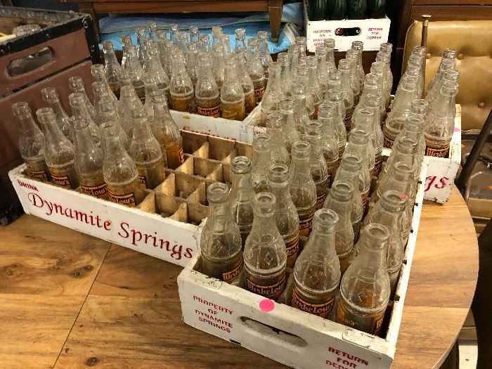 Dynamite Springs wooden cases; empty bottles