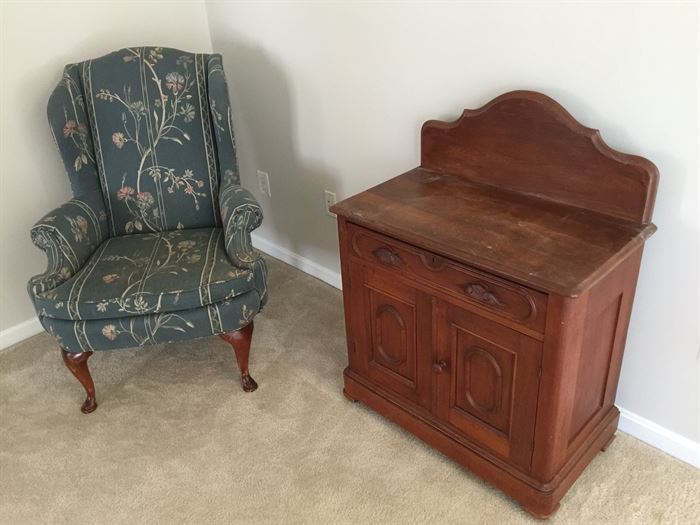 Another wingback chair and small cabinet