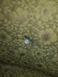 Button Cover on the couch is missing