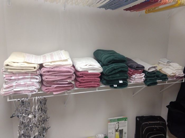 A whole shelf full of towels!