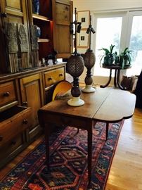 Antique drop leaf table with drawer and curved edge