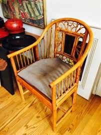 Vintage bamboo/rattan chair with a decorative motif on back