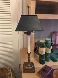 Antique brass desk lamp with metal shade and extended brass finial