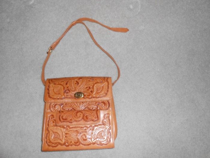 This purse is in mint condition!  Handmade with a leather lining.
