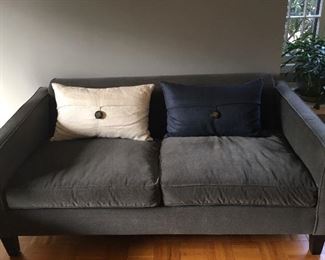 Candace Olsen designed condo sofa.  Gray with black legs.  Dimensions 66 x 36.
