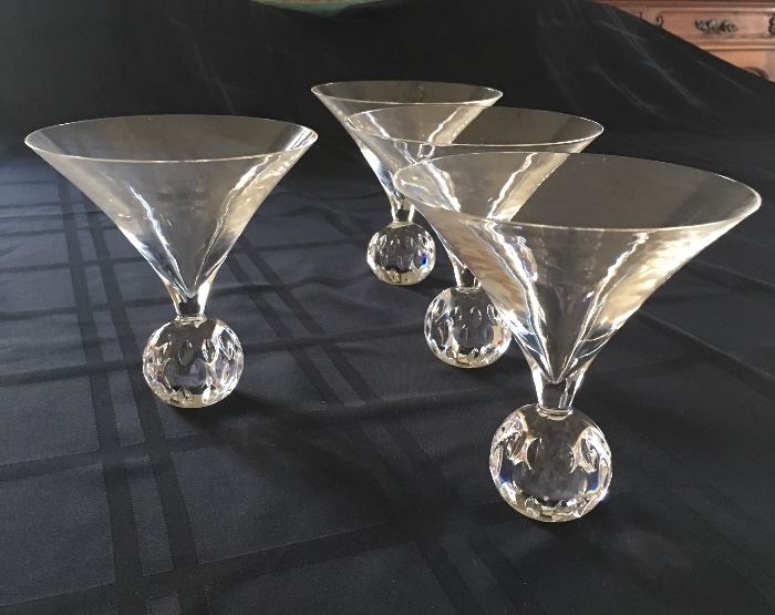 Saint Louis Crystal golf ball footed martini glasses.  Deep discounts will allow you to impress your golfer friends with gifts of these stunning items.