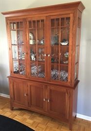 Ethan Allen two-piece china cabinet and buffet.  Cherry finish.  Dimensions: 58 x 17 x 32.