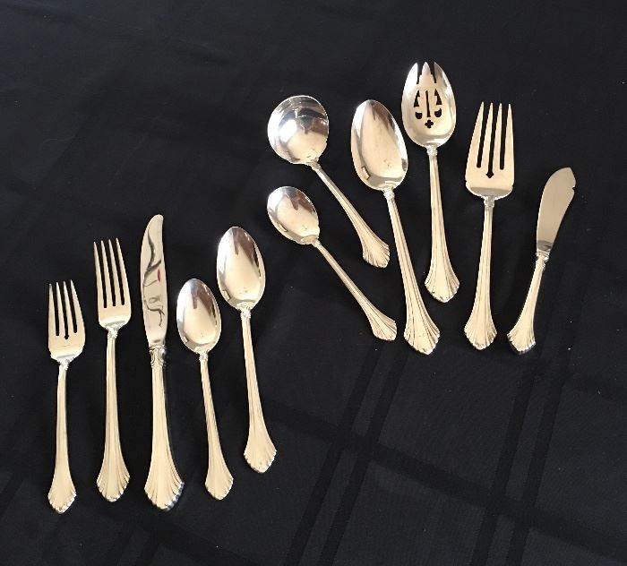 Wallace sterling silver flatware.  French Regency pattern.  Eight five-piece place settings, six serving pieces.