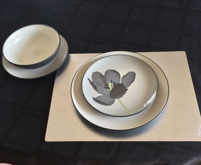 Noritake everyday dinnerware.  Four-piece place settings.