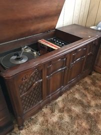 Audio system - turntable and AM/FM radio. Works and it's LOUD