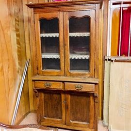 Antique cabinet with screened doors