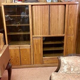 Solid oak entertainment center with smoked glass