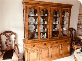 Thomasville Dining room set including china cabinet and table and six chairs (including two captains chairs)
