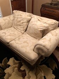 Cream sofa oriental inspired wooden oriental legs