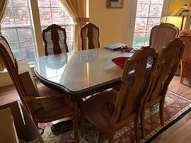 dining table with 6 chairs and 2 leafs.  There is a glass top for table when leafs are not used 