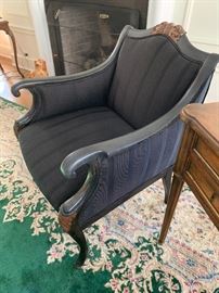 Carved wood upholstered chair
