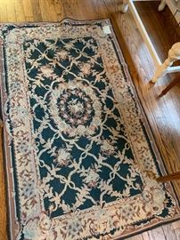 Needlepoint area rug