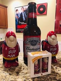 Budweiser steins and salt and pepper shakers.