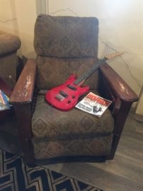 Comfy recliner and youth size electric guitar