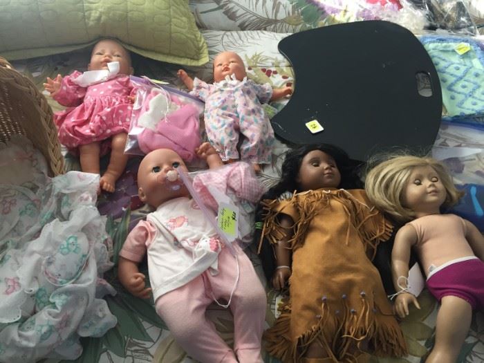 American girl dolls and many baby dolls