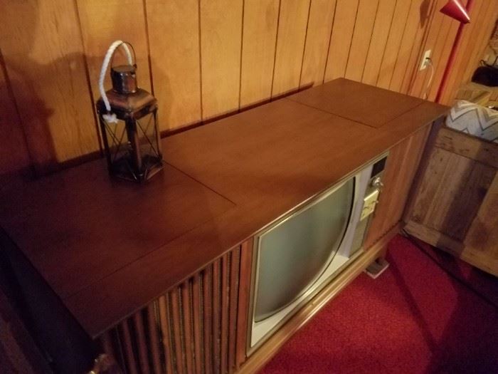 Very old TV with stereo and phonograph built in. 
