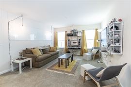 Sofa, side tables, side chairs, rug, coffee table, ottomans