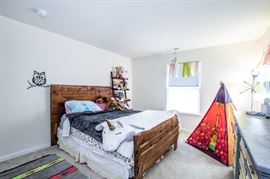 Teepee, bed, dresser, rug