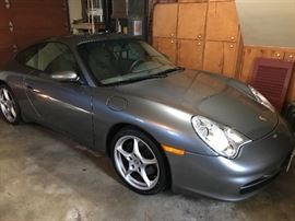 Garage kept dealer maintained Porsche Carrera 911 with 65,400 miles.