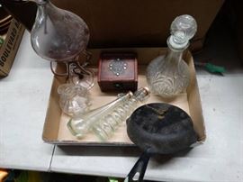 Cast iron pan clock, decanter and decor.