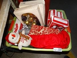 Tote of christmas decor.