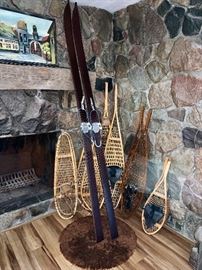 Vintage skis and various vintage snow shoes