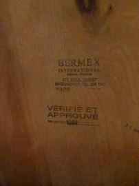 BERMEX International furniture! Made in French Canada! It says, "Buy Me!" in French right there. (Probably)