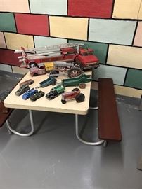 Child's picnic table, metal toys.............