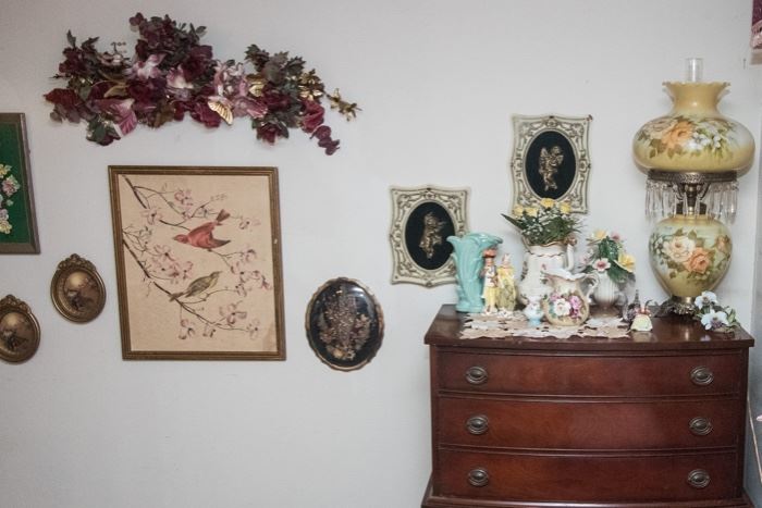 1930's 7 Drawer Chest 'Dixie' Mahogany Veneer w/Original Pulls.  (4'4"h x 3'1"w x 1'6"d):  $450.00. SOLD                                                                        Left to Right On Dresser Top:  McCoy Swan Vase:  SOLD  $27.00.  Figurine's, Porcelain Flowers, Pitchers and T-Pots:  Priced From $1.00 - 39.00.  Hand Painted Boudoir Lamp:  $120.00.  Art On Wall: Priced From $4.00 - $18.00.