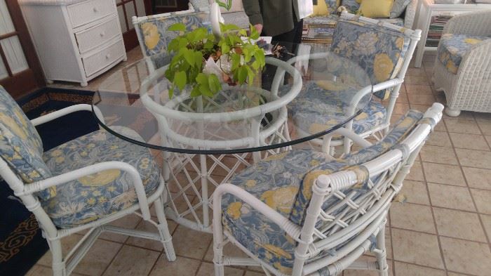 Wicker and glass table with chairs