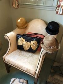 Beautiful chair & beautiful hats & purses