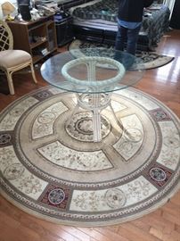 Glass Table & Round Rug