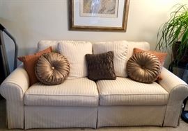 Loveseat.  VERY comfortable and fabric is neutral and lux.
