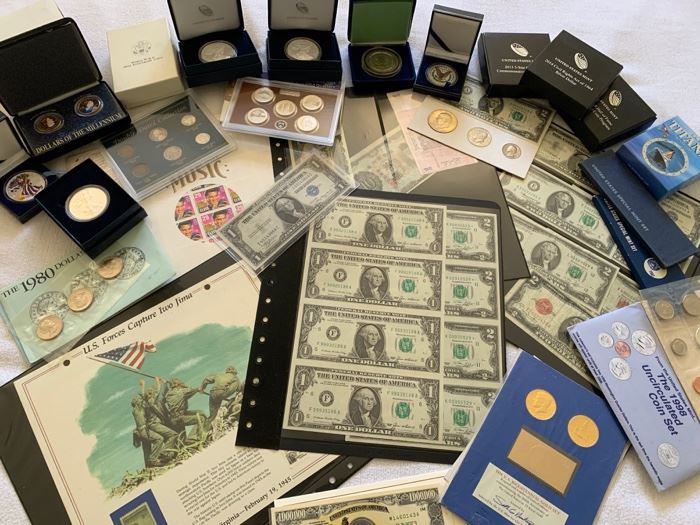 Coin Collection includes uncirculated currency, silver commemorative coins, individual coins dating from 1803