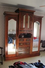 Inlaid Armoires, outfitted to maximize storage while retaining beauty! So different than the mass-produced items of today