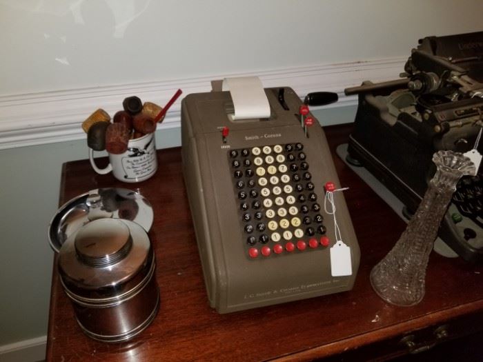 vintage adding machine and pipes