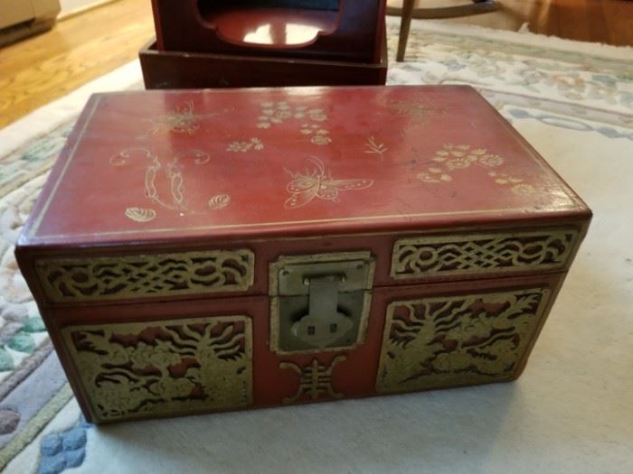 antique Chinese leather chest with brass and gold decorative painting