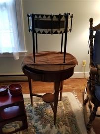 antique round table and 1900 snare drum