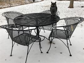 Wrought iron outdoor table with 4 chairs